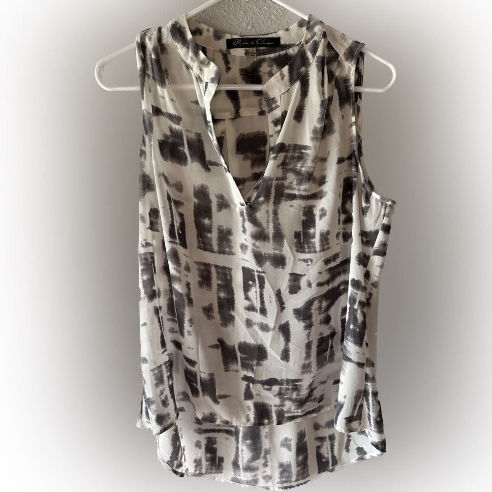 Size small grey and white sleeveless too